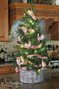 Thrift store basket becomes kitchen counter Christmas tree basket with a simple paint technique.