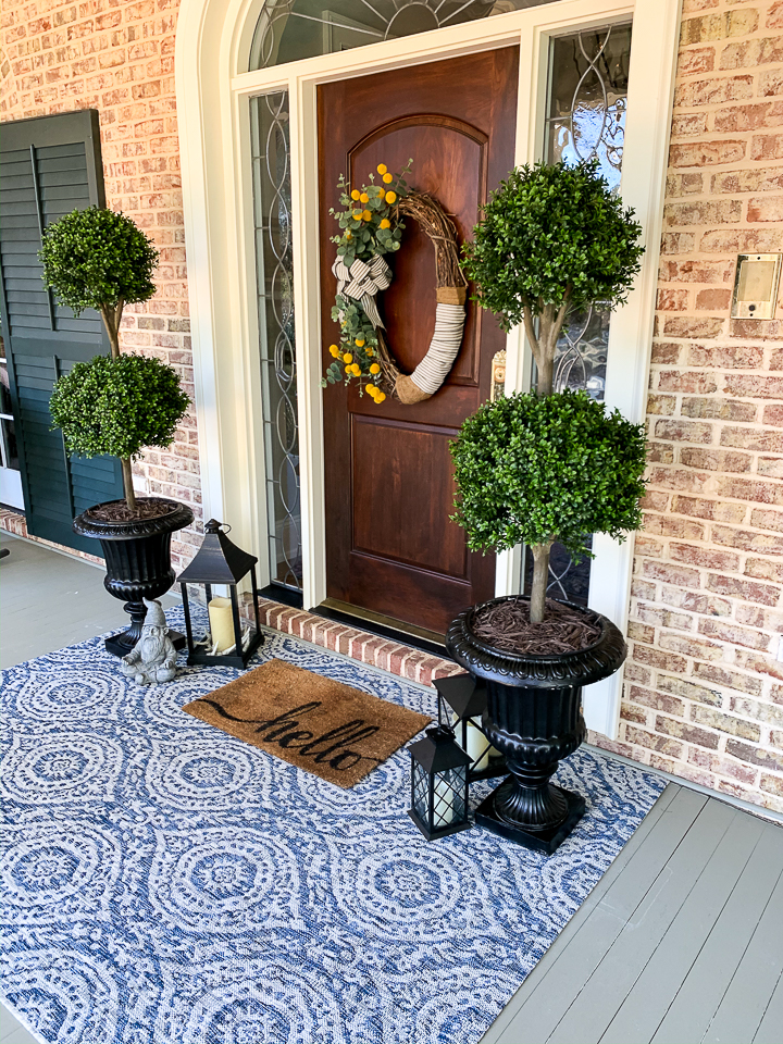 https://www.oursouthernhomesc.com/wp-content/uploads/boutique-rugs-front-porch-2760.jpg