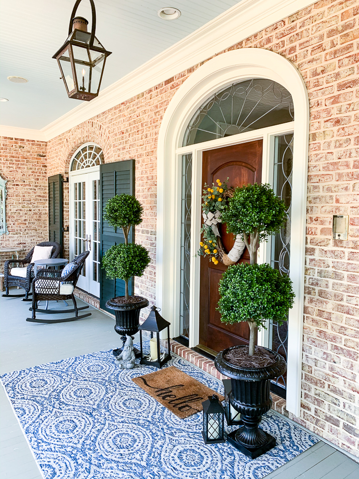 https://www.oursouthernhomesc.com/wp-content/uploads/boutique-rugs-front-porch-6461.jpg
