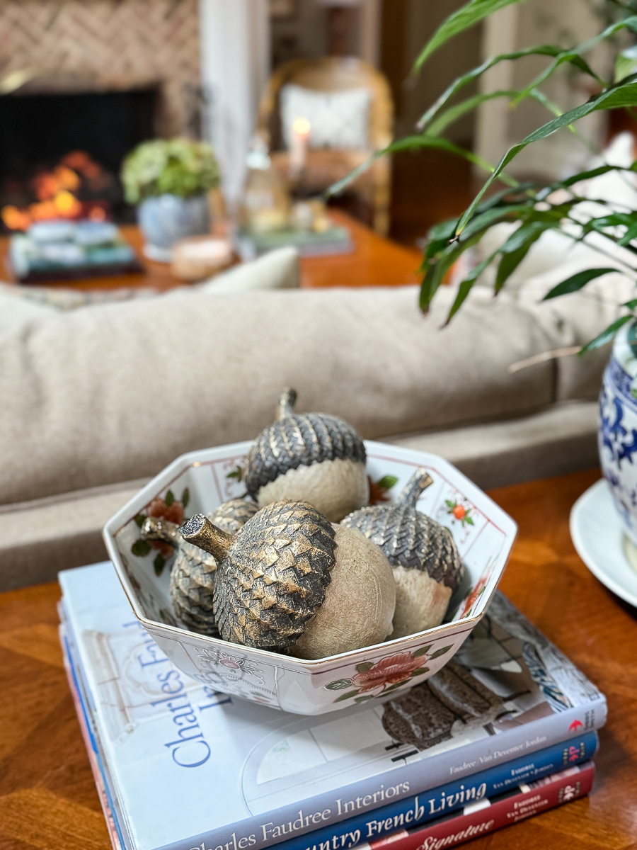 faux acorns in bowl