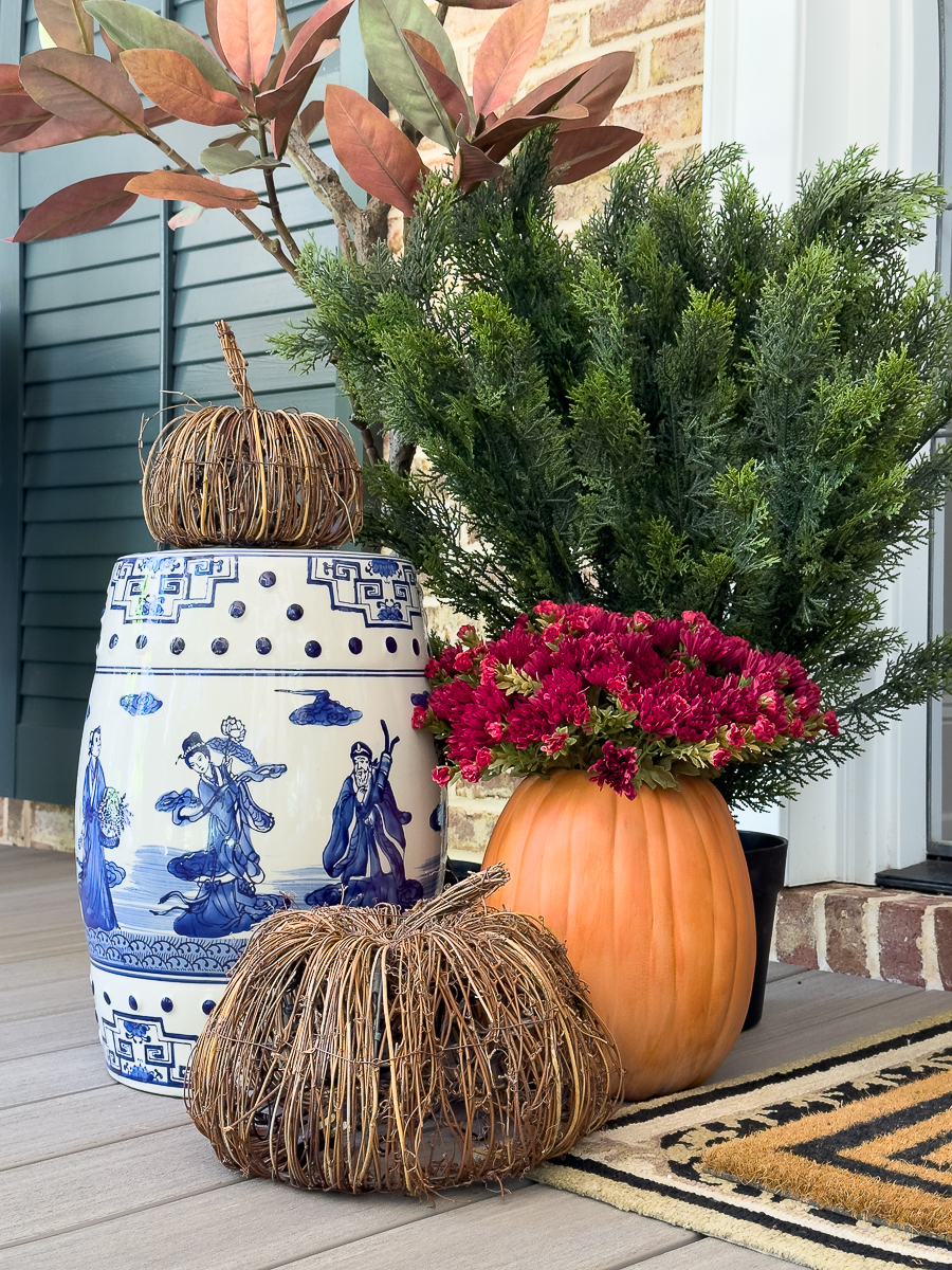 faux pumpkins on porch