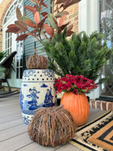 faux pumpkins on porch