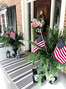 Southern Patriotic Porch with simple ideas to show your pride! #porch #patrioticporch #southernporch #patrioticdecor #patrioticideas #4thofjuly #laborday #memorialday