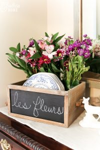 Thrift store crate makeover becomes a stylish container for the home!