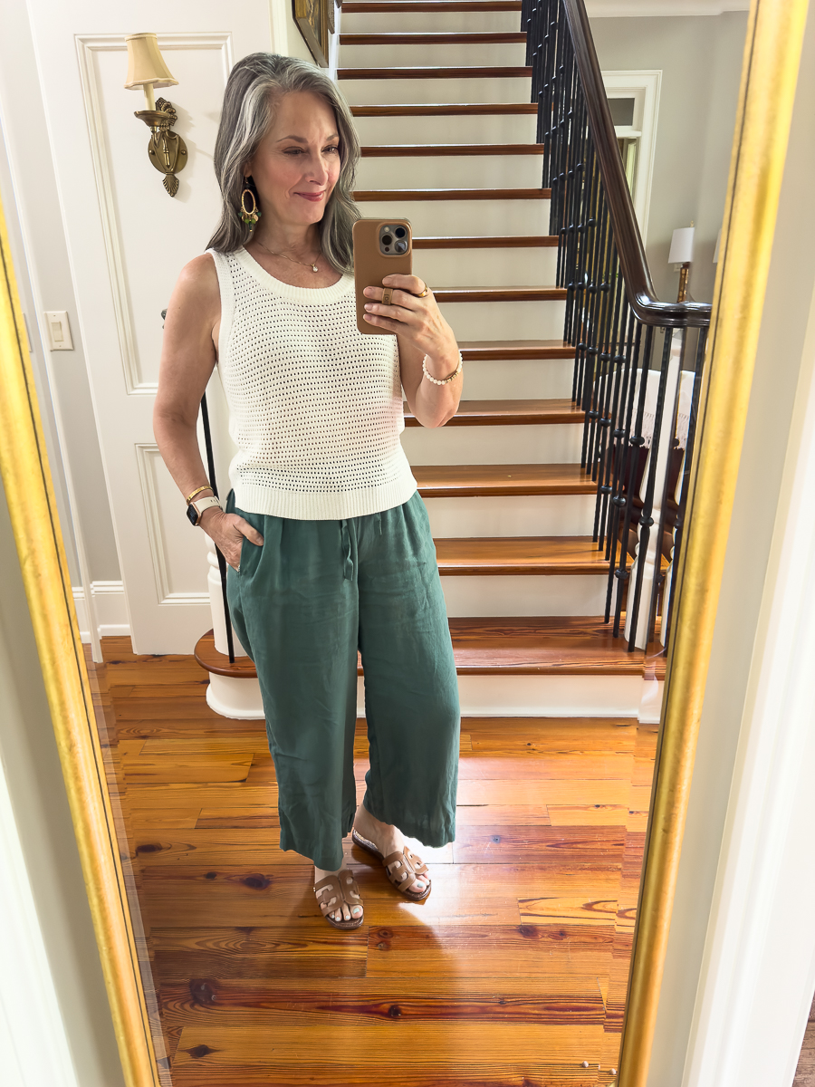 white sweater with green linen pants